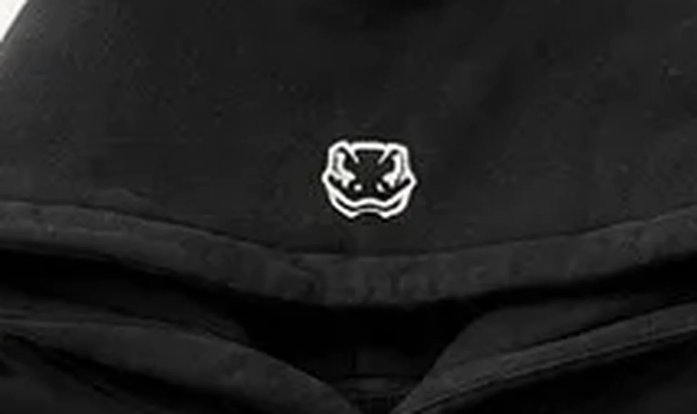 Hood detail — the embroidered head mark